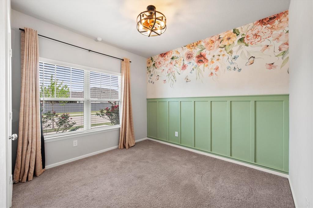 6910 Prairieside Trail Venus, TX 76084 - Photo 25 of 40 5th bedroom is located downstairs adjacent to a full bathroom. Would make a great in-law suite or private office!