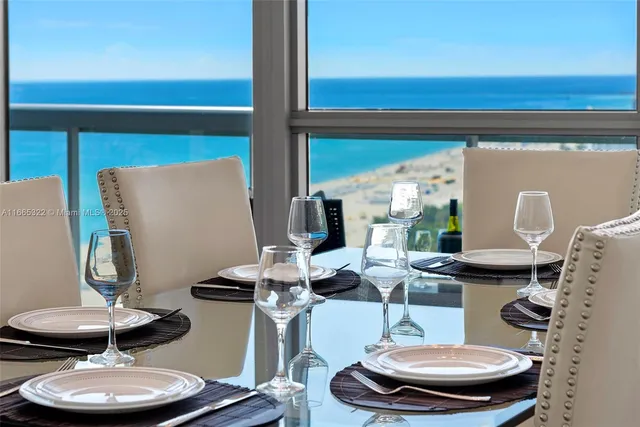 a bathroom with a toilet and a mirror