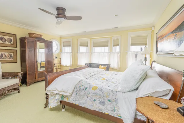 a spacious bathroom with a sink and a mirror