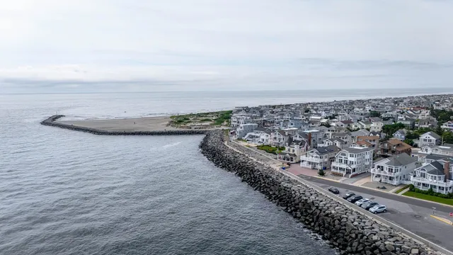 a view of a ocean view and car parked