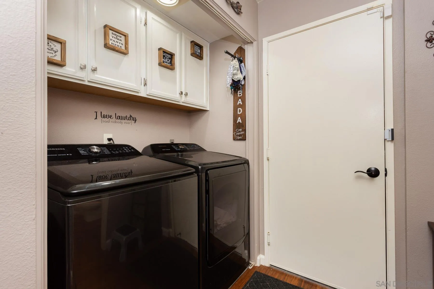 3142 Lamar Court Spring Valley, CA 91977 - Photo 11 of 16 a utility room with dryer and washer