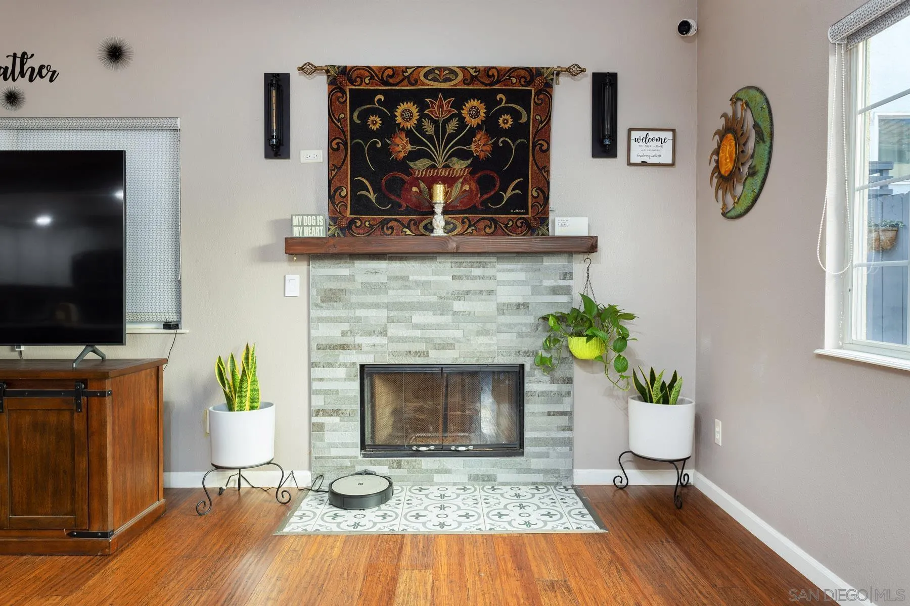 3142 Lamar Court Spring Valley, CA 91977 - Photo 4 of 16 a living room with furniture and a fireplace