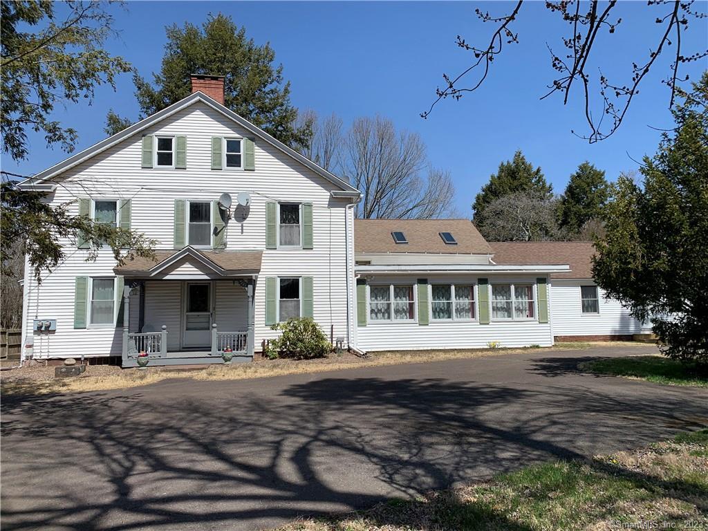 1 Pinney Road Somers, CT 06071 - Photo 1 of 1 a front view of a house with yard