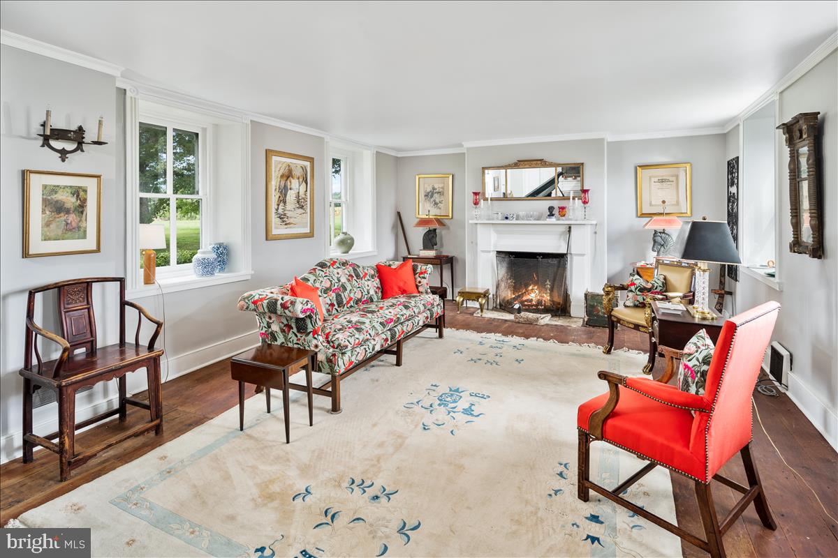 2753 Rushland Road Jamison, PA 18929 - Photo 21 of 60 a living room with furniture a fireplace and a window