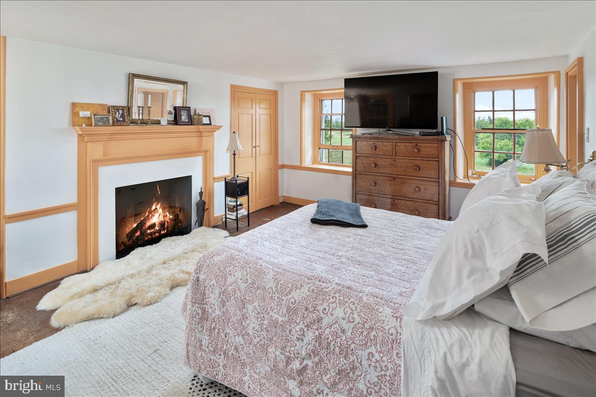 2753 Rushland Road Jamison, PA 18929 - Photo 24 of 60 a bedroom with a bed and a flat screen tv