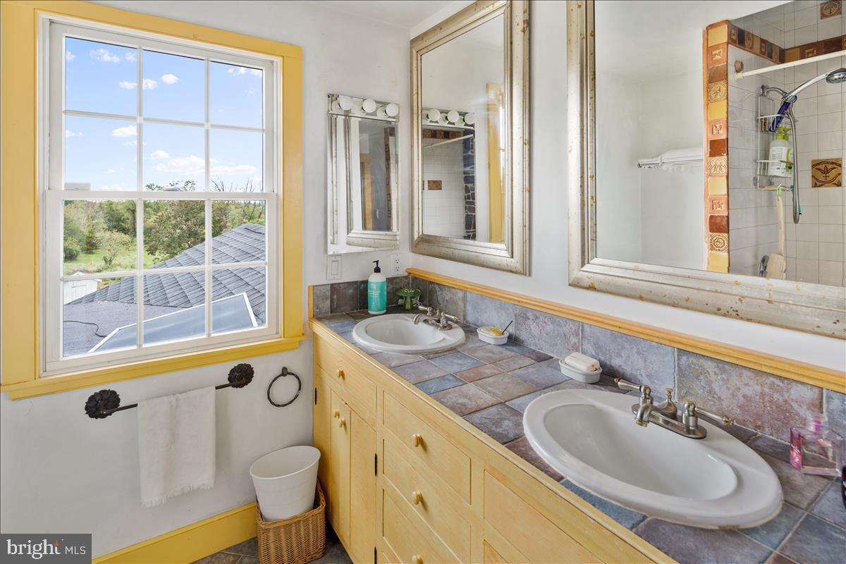 2753 Rushland Road Jamison, PA 18929 - Photo 31 of 60 a bathroom with a granite countertop sink and a mirror
