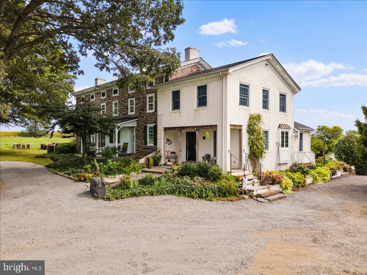 2753 Rushland Road Jamison, PA 18929 - Photo 5 of 60 a front view of a house with a garden