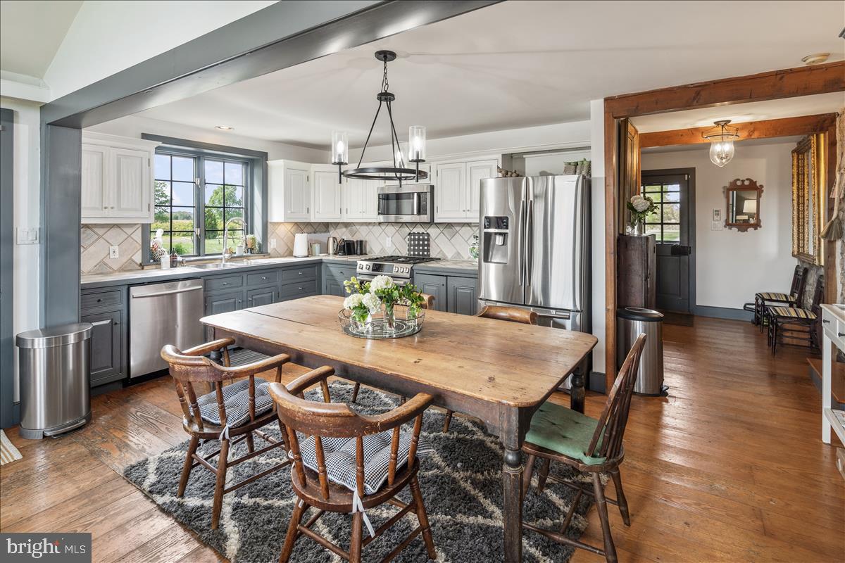 2753 Rushland Road Jamison, PA 18929 - Photo 7 of 60 a view of a dining room with furniture window and wooden floor