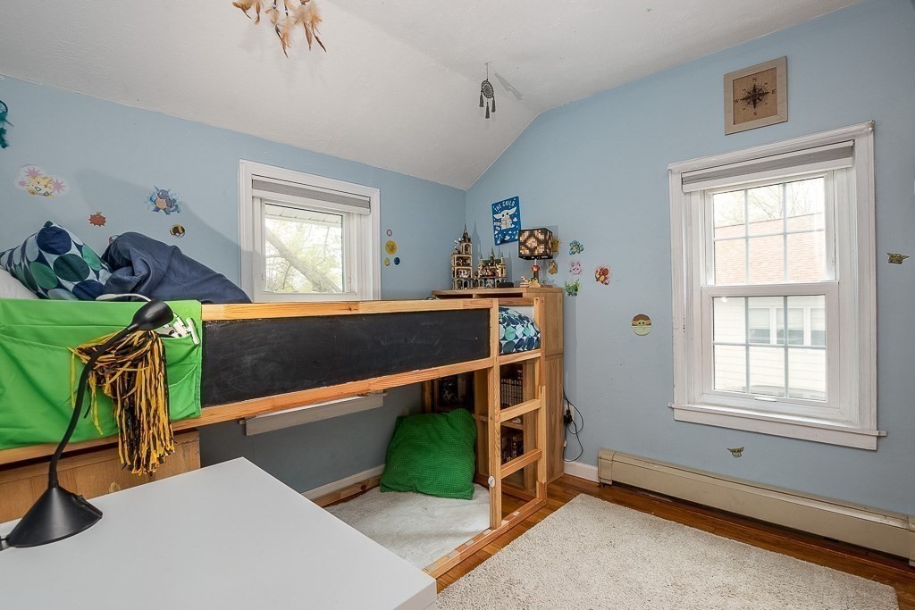 217 Lawrence Street Canton, MA 02021 - Photo 20 of 34 a view of a room with furniture and windows