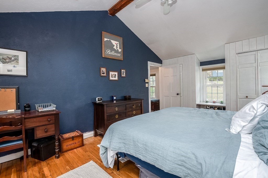 217 Lawrence Street Canton, MA 02021 - Photo 27 of 34 a bedroom with a bed and a desk