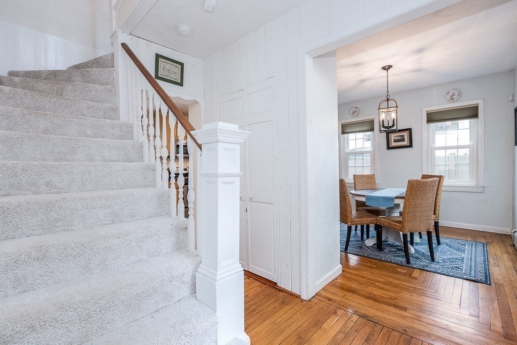 217 Lawrence Street Canton, MA 02021 - Photo 29 of 34 a view of a livingroom with furniture and wooden floor
