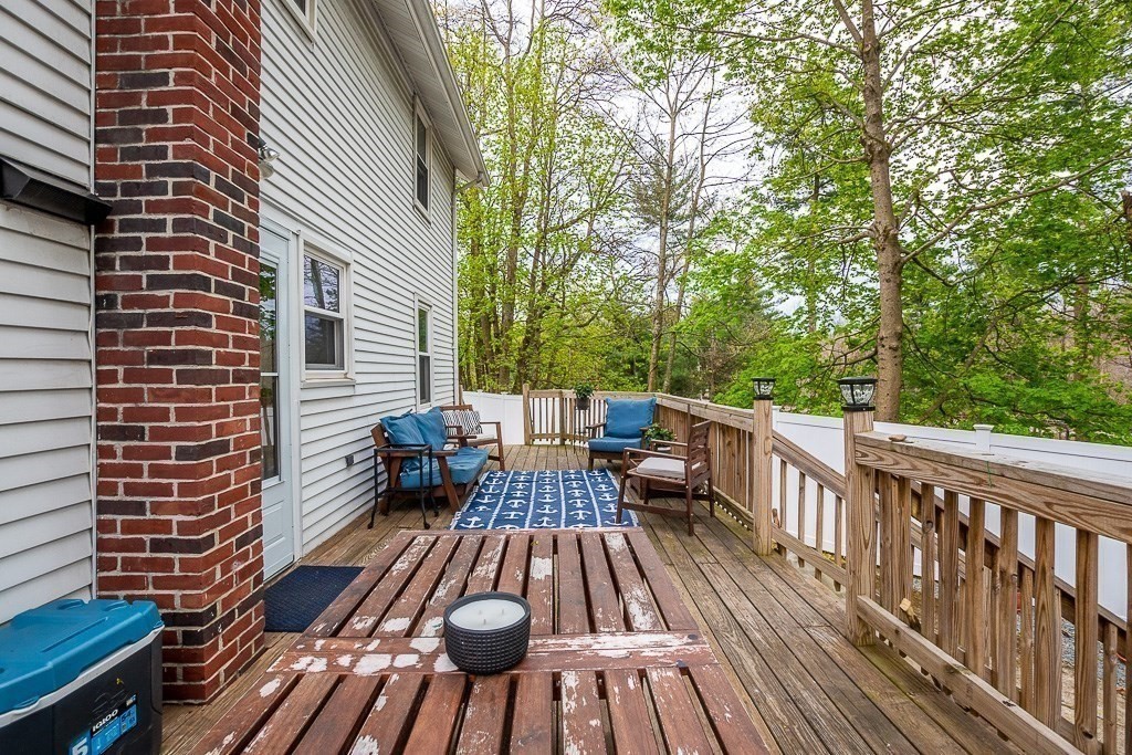 217 Lawrence Street Canton, MA 02021 - Photo 30 of 34 a view of balcony with wooden floor and seating space