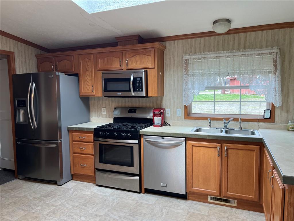 158 Nolt Road Mayport, PA 16240 - Photo 2 of 34 a kitchen with a sink stove and refrigerator