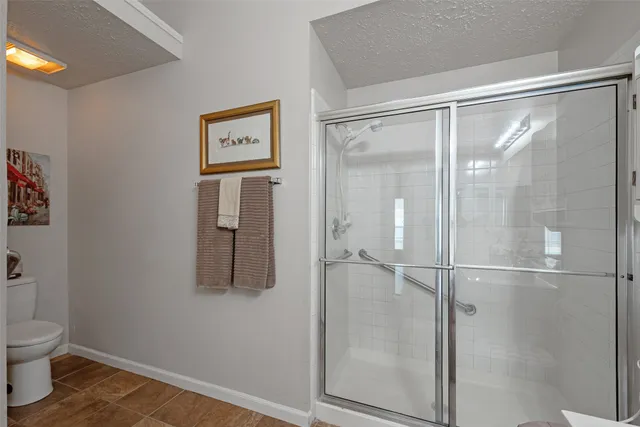 a bathroom with a sink double vanity and a mirror