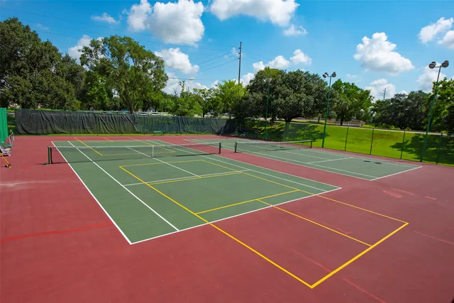 an aerial view of a house with outdoor space