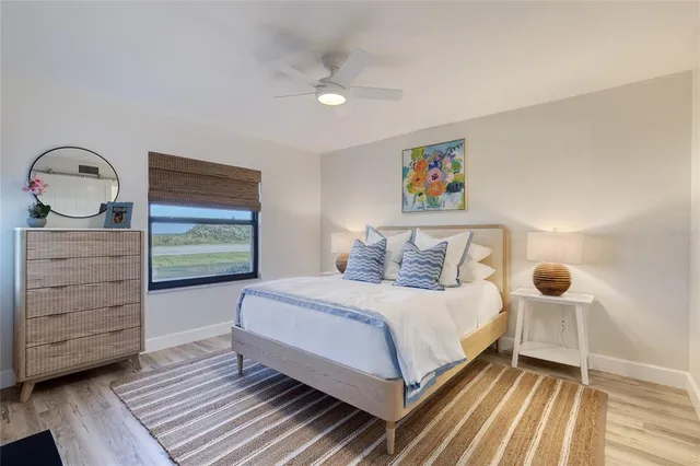 a bedroom with a bed and a dresser