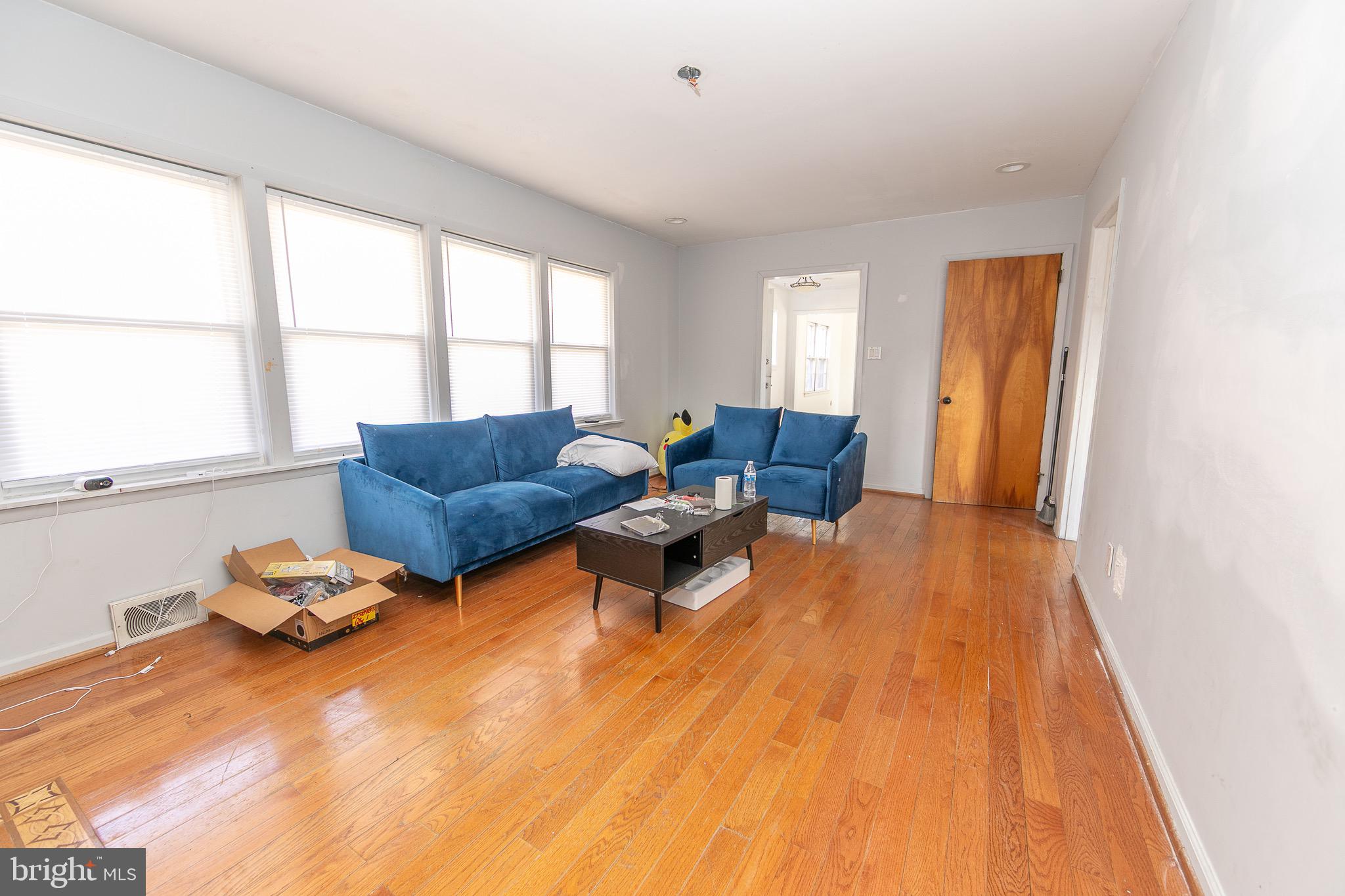 23 School Lane Carneys Point, NJ 08069 - Photo 14 of 21 a living room with furniture and a large window