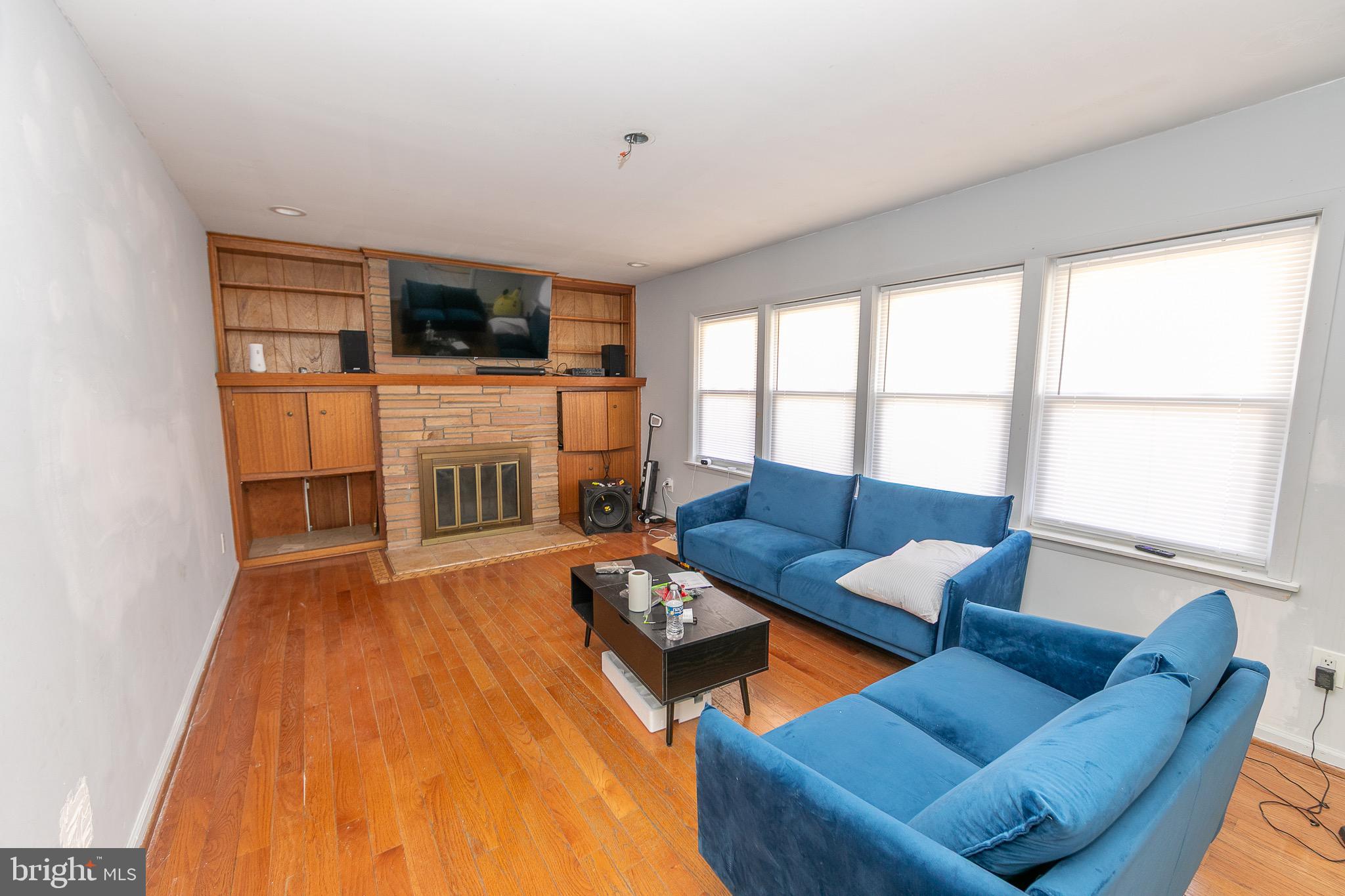 23 School Lane Carneys Point, NJ 08069 - Photo 15 of 21 a living room with furniture and a flat screen tv
