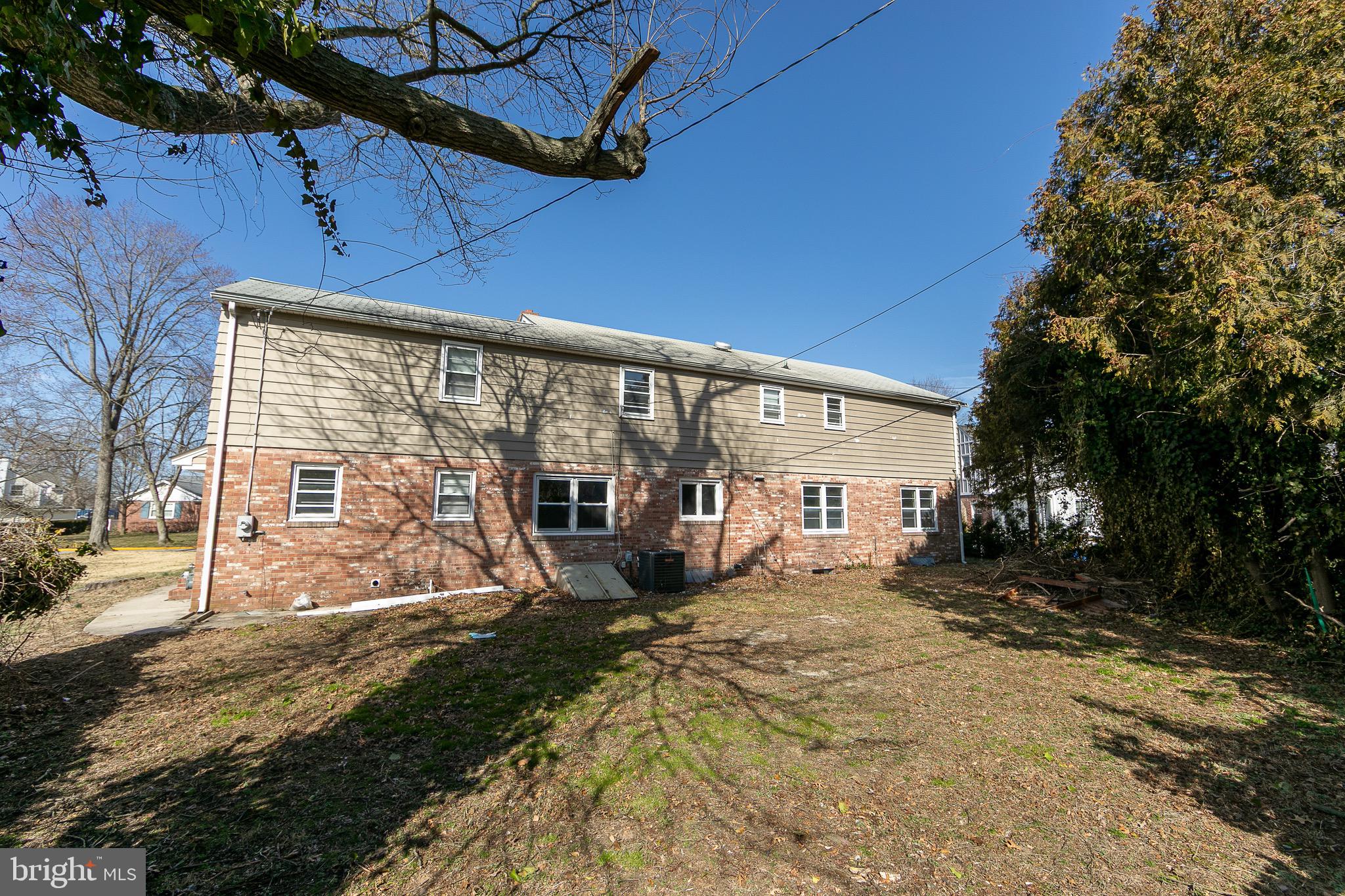 23 School Lane Carneys Point, NJ 08069 - Photo 21 of 21 a view of a house with a patio