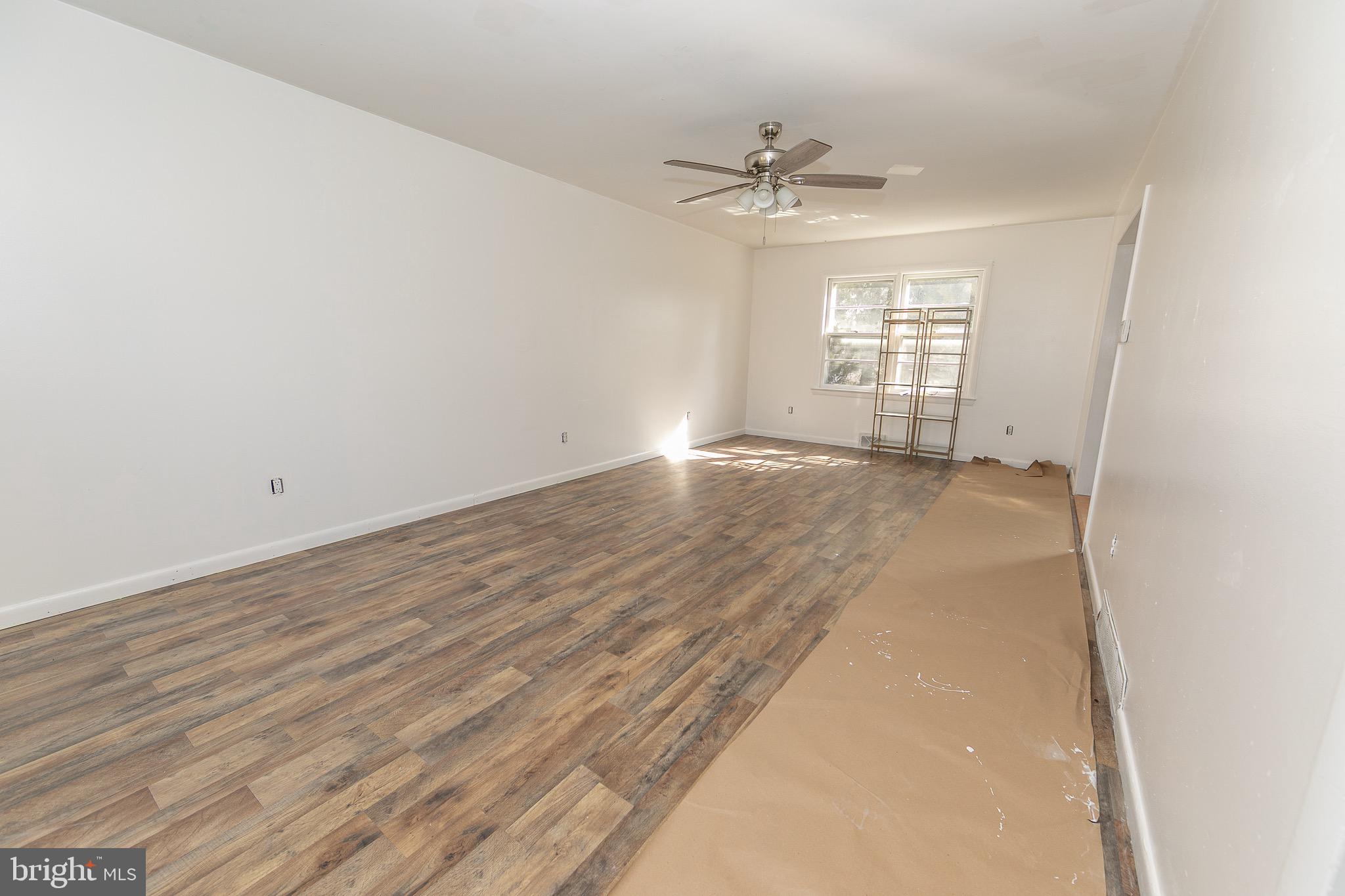23 School Lane Carneys Point, NJ 08069 - Photo 4 of 21 wooden floor in an empty room