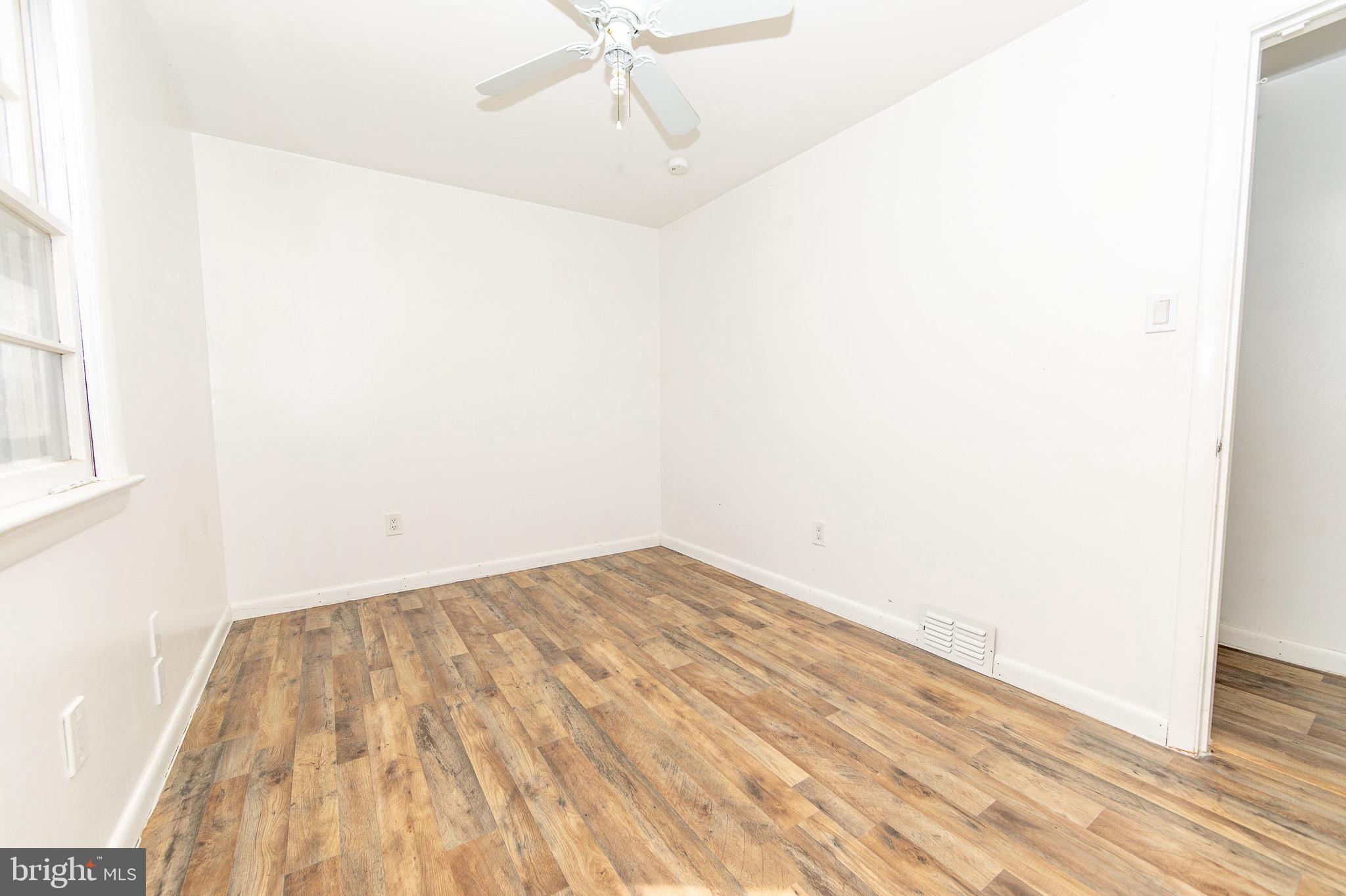 23 School Lane Carneys Point, NJ 08069 - Photo 9 of 21 a view of a room with wooden floor