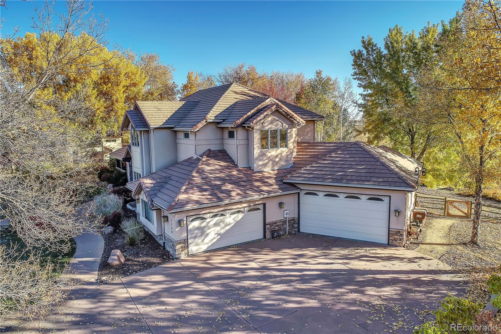 7748 Crestview Lane Niwot, CO 80504 - Photo 3 of 40 a front view of a house with a yard