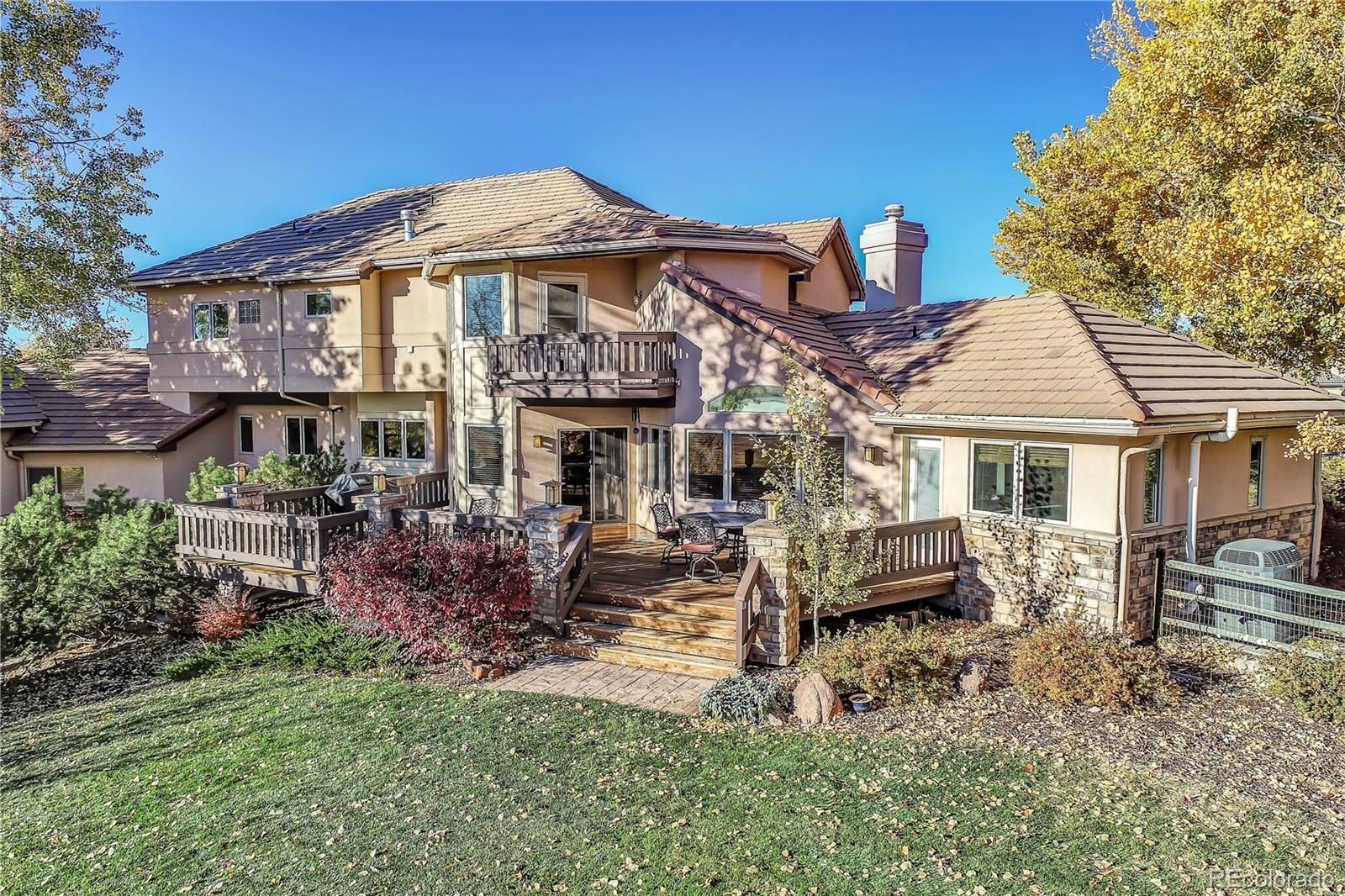 7748 Crestview Lane Niwot, CO 80504 - Photo 34 of 40 a front view of a house with garden