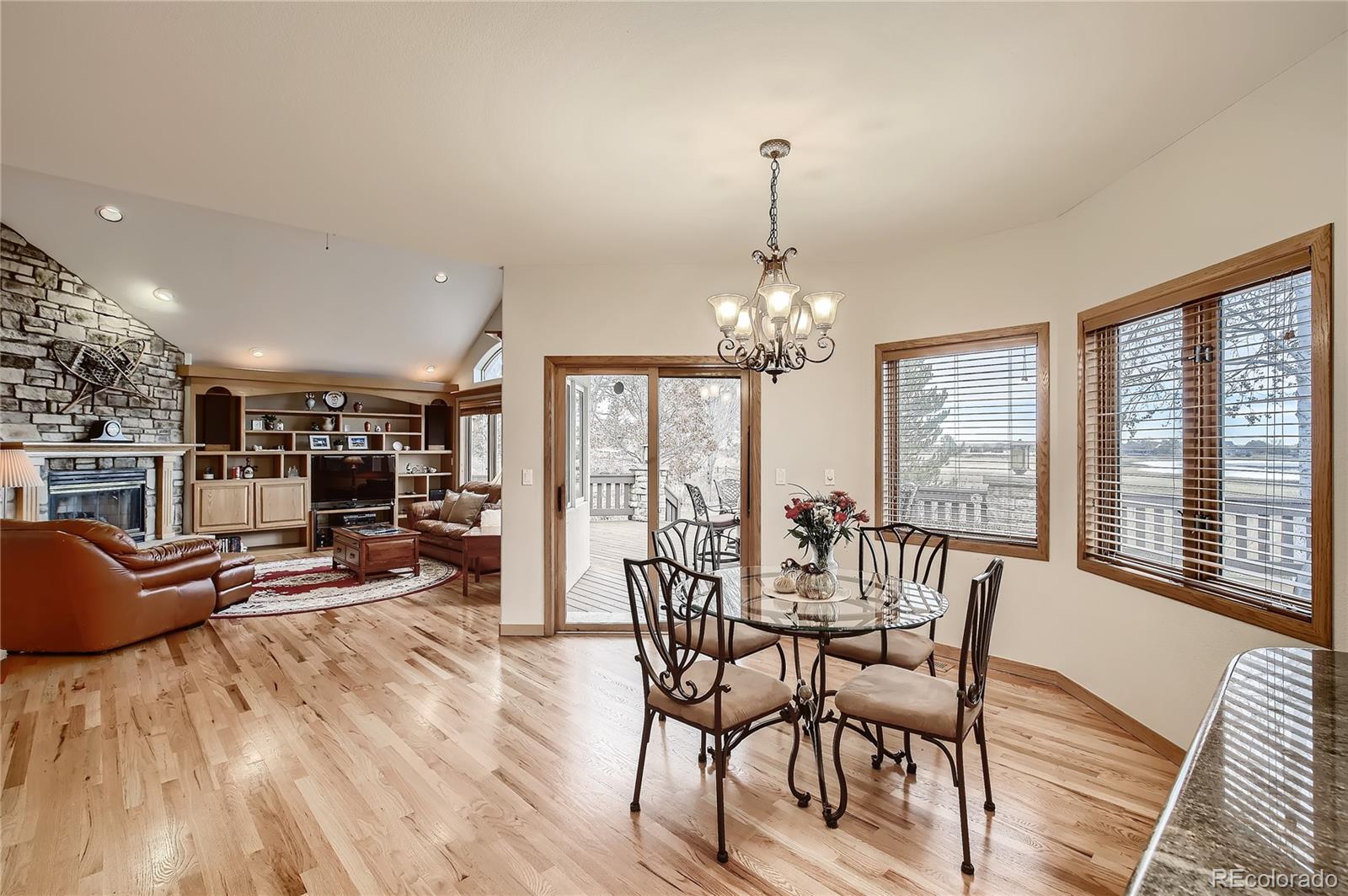 7748 Crestview Lane Niwot, CO 80504 - Photo 10 of 40 a view of a dining room with furniture window and outside view