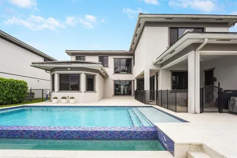 a view of house with yard