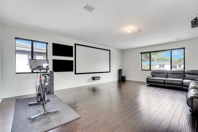 a view of livingroom with furniture and floor to ceiling window