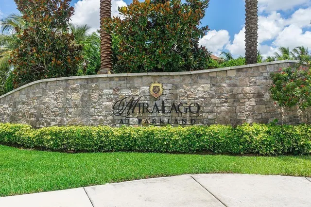 a wooden fence with some plants