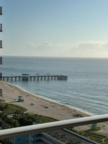 a view of a ocean from a balcony
