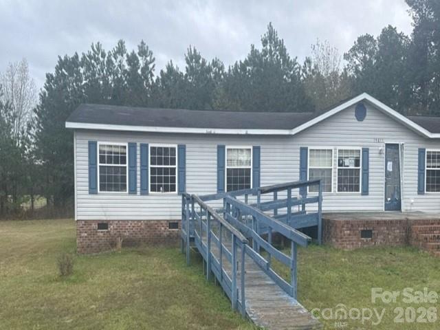 15841 St Johns Church Road Gibson, NC 28343 - Photo 2 of 9 front view of house with a yard