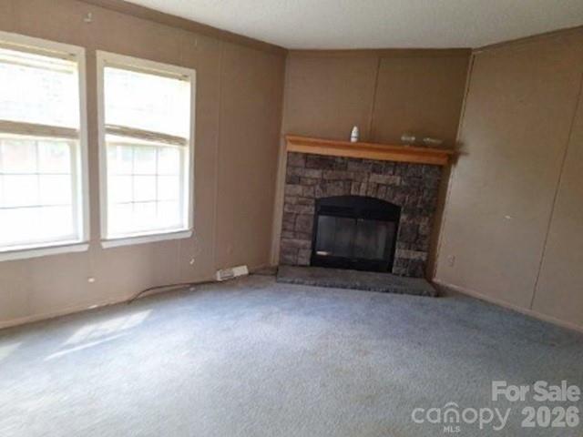 15841 St Johns Church Road Gibson, NC 28343 - Photo 4 of 9 a view of empty room with a fireplace