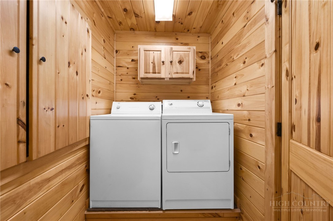 259 Greenbriar Road Beech Mountain, NC 28604 - Photo 29 of 41 a utility room with dryer and washer