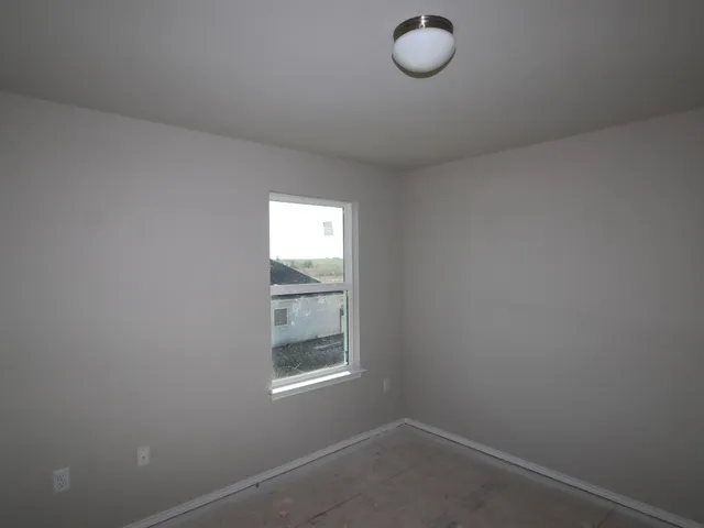 an empty room with a window