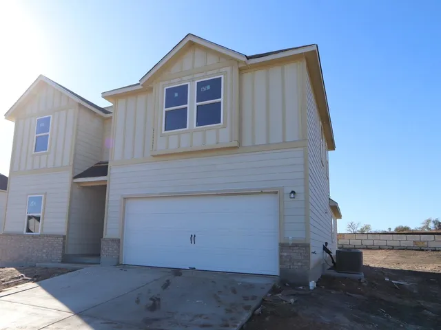 a view of backyard of house