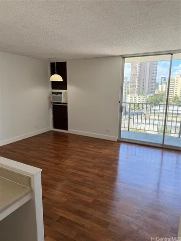 a view of a kitchen from the hallway