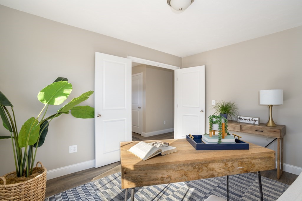 2 Katlyn Circle, Unit 15 Rochester, MA 02770 - Photo 14 of 16 a bedroom with a bed potted plant with the outer view
