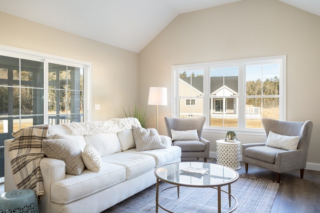 2 Katlyn Circle, Unit 15 Rochester, MA 02770 - Photo 4 of 16 a living room with furniture and a large window