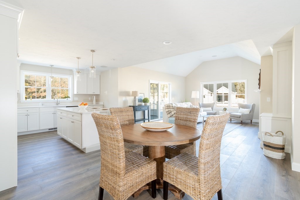 2 Katlyn Circle, Unit 15 Rochester, MA 02770 - Photo 6 of 16 a view of a dining room with furniture and wooden floor