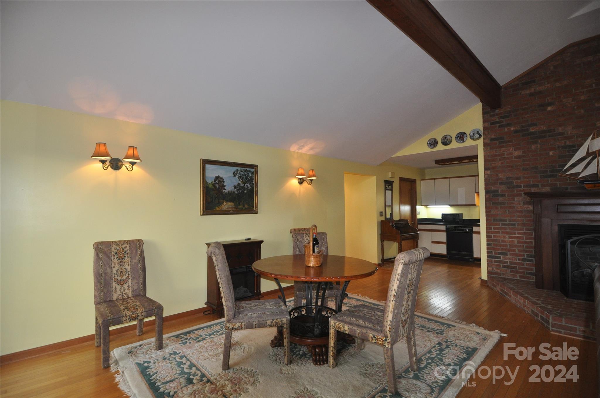 451 Bill Holbert Road Tryon, NC 28782 - Photo 27 of 35 a view of a dining room with furniture and wooden floor