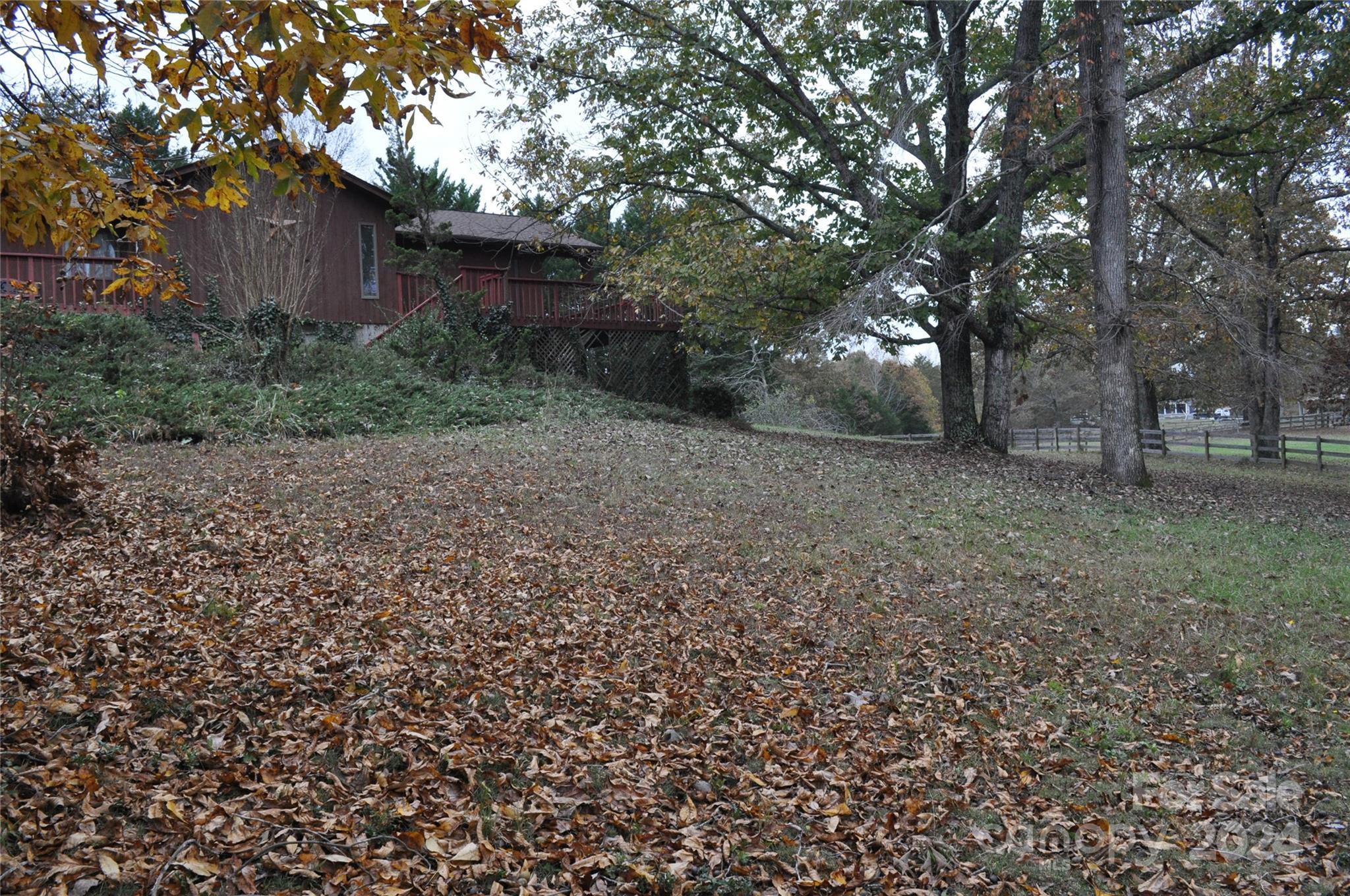 451 Bill Holbert Road Tryon, NC 28782 - Photo 3 of 35 a view of a backyard with large trees