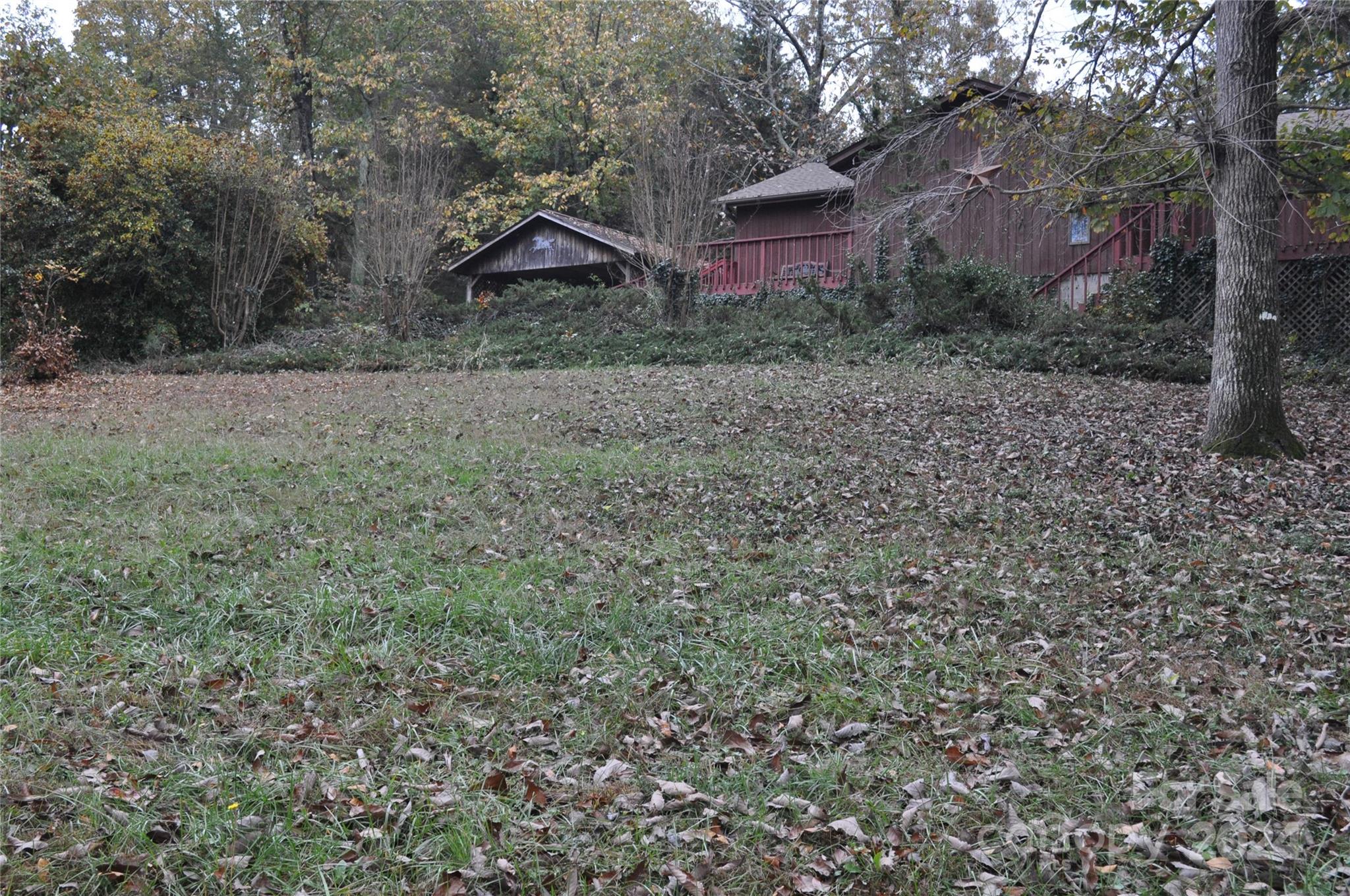451 Bill Holbert Road Tryon, NC 28782 - Photo 4 of 35 a view of a house with a yard