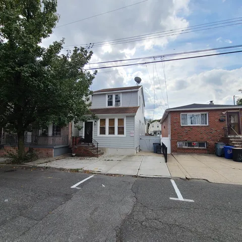 a view of a car in front of a building