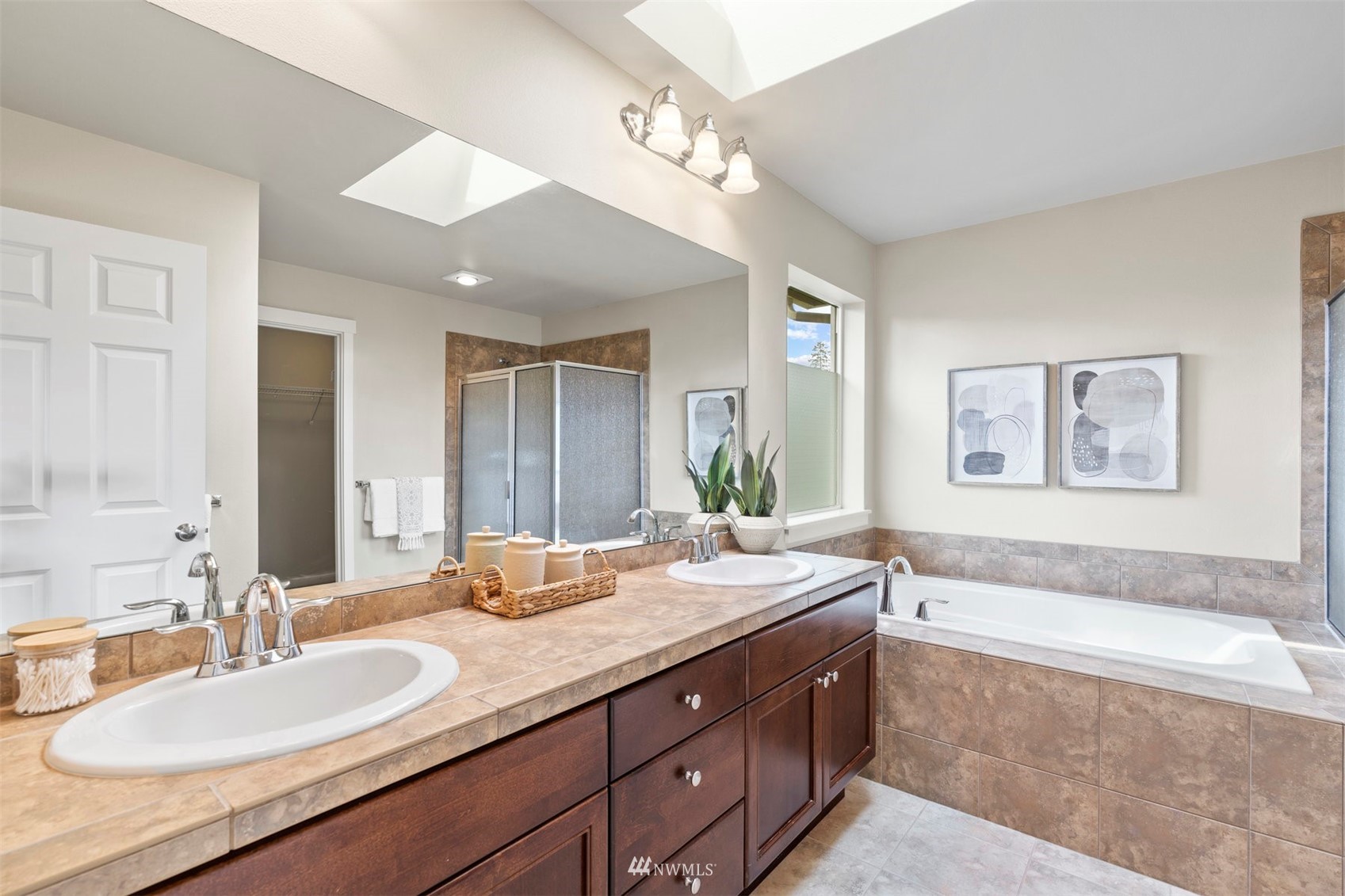 4320 230th Place Southeast Bothell, WA 98021 - Photo 20 of 31 a bathroom with a granite countertop sink mirror and bathtub