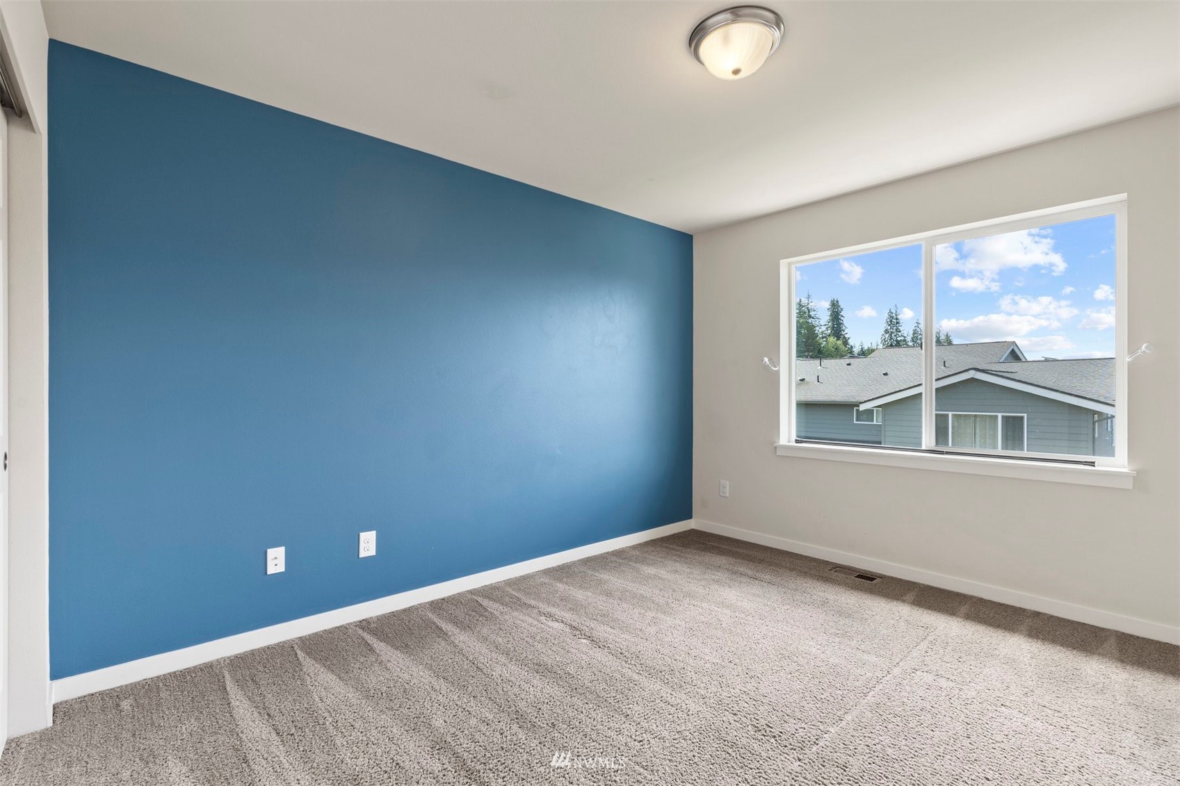 4320 230th Place Southeast Bothell, WA 98021 - Photo 24 of 31 an empty room with a window