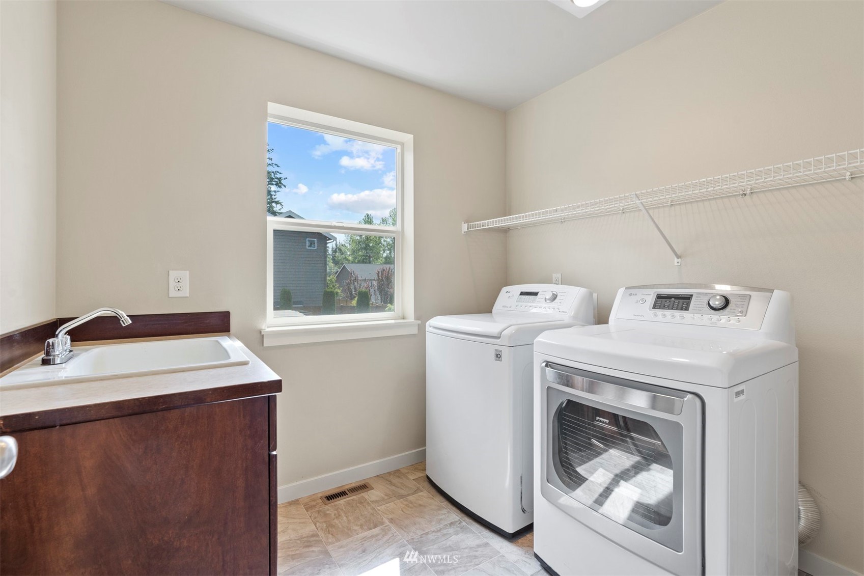 4320 230th Place Southeast Bothell, WA 98021 - Photo 27 of 31 a utility room with dryer and washer