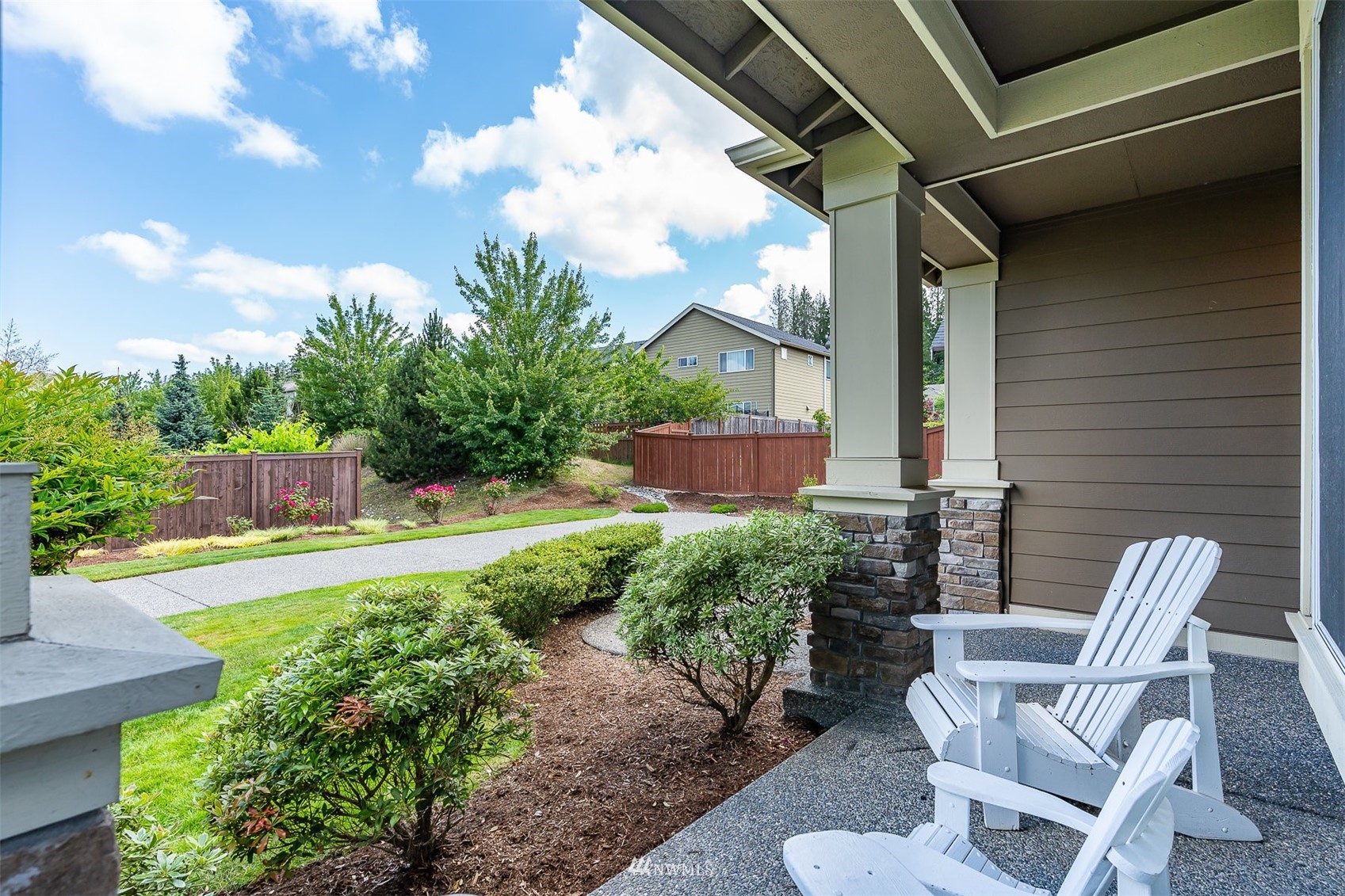 4320 230th Place Southeast Bothell, WA 98021 - Photo 3 of 31 a view of backyard with outdoor seating and plants