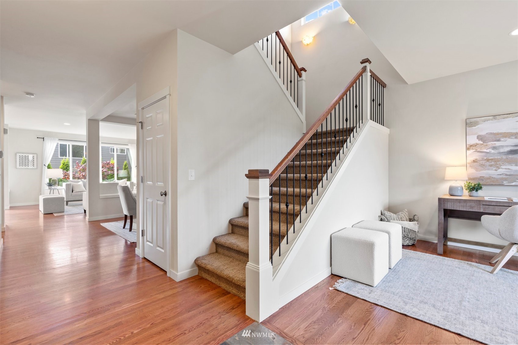 4320 230th Place Southeast Bothell, WA 98021 - Photo 4 of 31 a view of entryway and hall with wooden floor